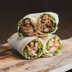 Wraps met pittige kippenreepjes, rauwkost en sausjes